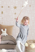 This fun and vibey pink wallpaper will add to any kid's room or nursery. 
