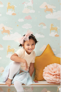 Rainbows, soft clouds, and unicorns, sounds perfect for a young girl's room, or nursery.