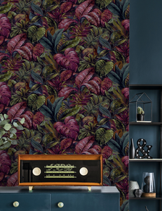 This funky tropical palm leaf wallpaper adds an element of fun with the addition of purple plum colours. 