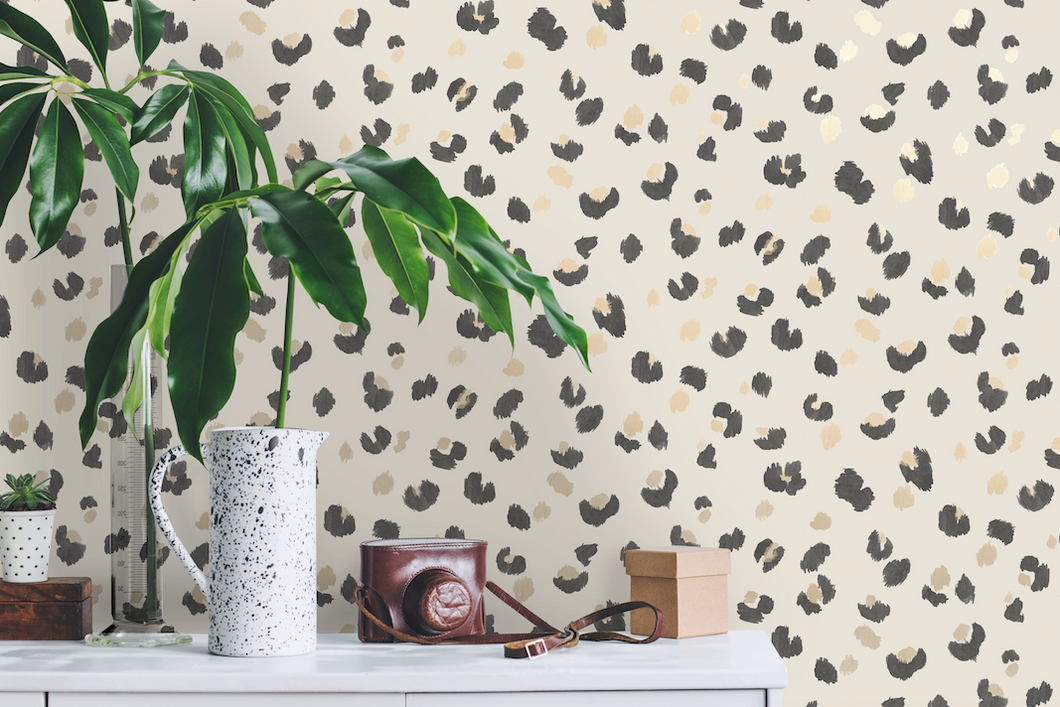 this colourful animal print wallpaper design with the leopard colours of black, cream and browny gold will look fabulous in a kitchen, hallway or powder room.