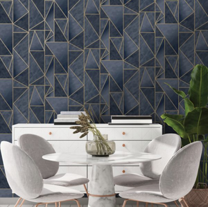 This navy blue and gold geometric print wallpaper design has texture and metallic lines which makes this a sophisticated yet trendy choice.