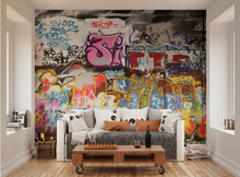 Scibbles, scratched, and sprayed artwork makes this Graffiti wall mural a real feel for a graffiti filled space using bright colours and fonts. 