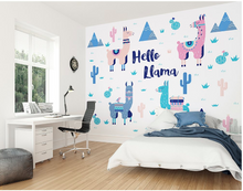 This cute Hello Llama wall  mural has soft pink, green, and blue colours with the use of quirky llamas, cactus and mountains.