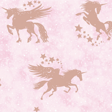 Rose Gold unicorns with pretty little stars on a soft pink background makes for a gorgeous wallpaper choice for any little girl's room.