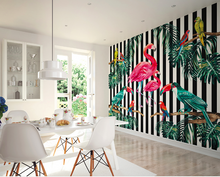 Bold black and white stripes with the bright colours of Tropical leaves, flamingoes and birds makes for a great statement as a feature wall. Perfect for a modern hallway wallpaper.