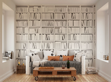 A clever take on a white colour palette and books stacked neatly on library isles. 