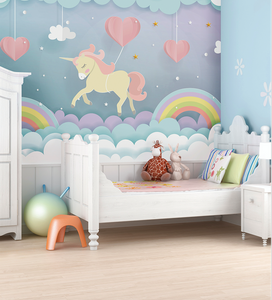Transform your child's baby room into a dreamy fairytale. What a delightful unicorn and rainbow wallpaper with hearts and puffy clouds.