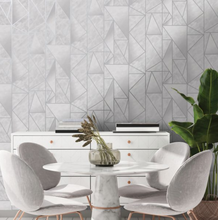Wallpaper with geometrics can really make a difference to a room- this design in grey and silver is great for a home office or boardroom. 